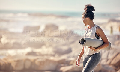 Buy stock photo Fitness, peace and yoga mat with woman by ocean with mockup for sports, zen and workout training. Pilates, exercise and health with girl at beach for summer, wellness and meditation in nature