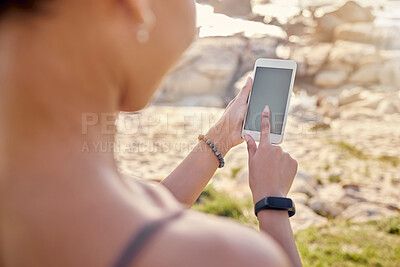Buy stock photo Woman, hands and phone mockup at the beach for social media, communication or chatting in the outdoors. Hand of female touching smartphone chromakey display screen for advertising, marketing or app
