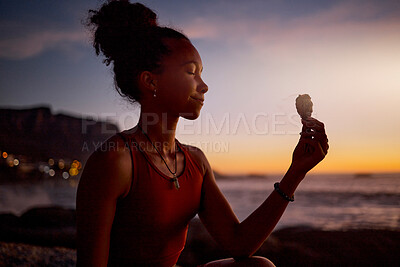 Buy stock photo Beach meditation, sunset and yoga woman with sage aromatherapy smoke for aura, soul or chakra energy healing.   Zen mindset, pilates mindfulness and black girl meditate for twilight spiritual balance