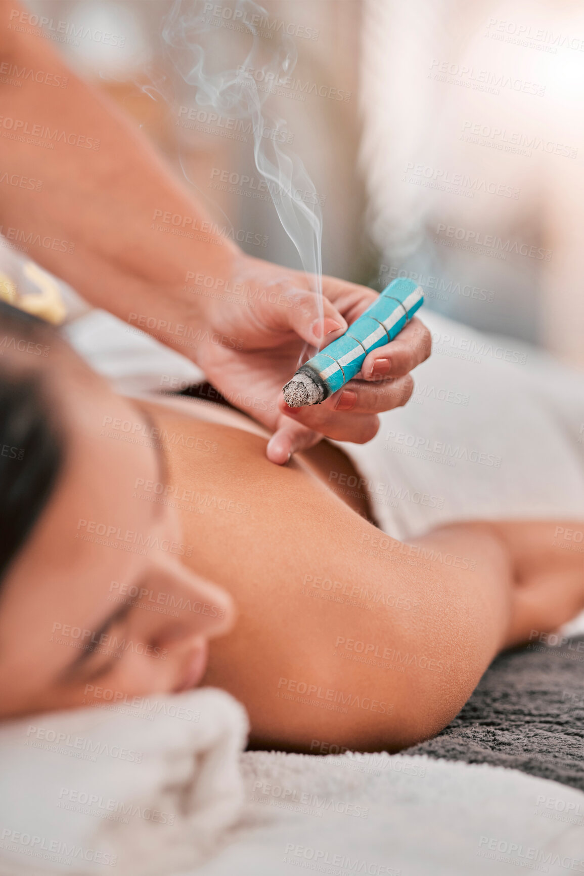 Buy stock photo Spa, wellness and luxury meditation for woman on massage bed. Zen, healthy skincare and smoke therapy for mindfulness, beauty and balance chakra energy or relax, calm and mental or skin healthcare  