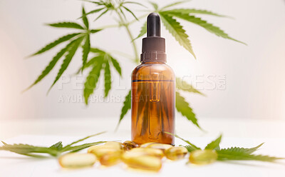 Buy stock photo Cannabis, marijuana and product with oil of cbd for alternative medicine, natural skincare or healthcare supplement. Beauty, luxury and wellness with legal pills and weed plant for anxiety and stress