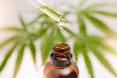 Buy stock photo Dropper, glass bottle and cbd oil for holistic healthcare, pain management or stress control in anxiety, depression or ptsd relief. Zoom, cannabis leaf or marijuana medicine product from weed extract