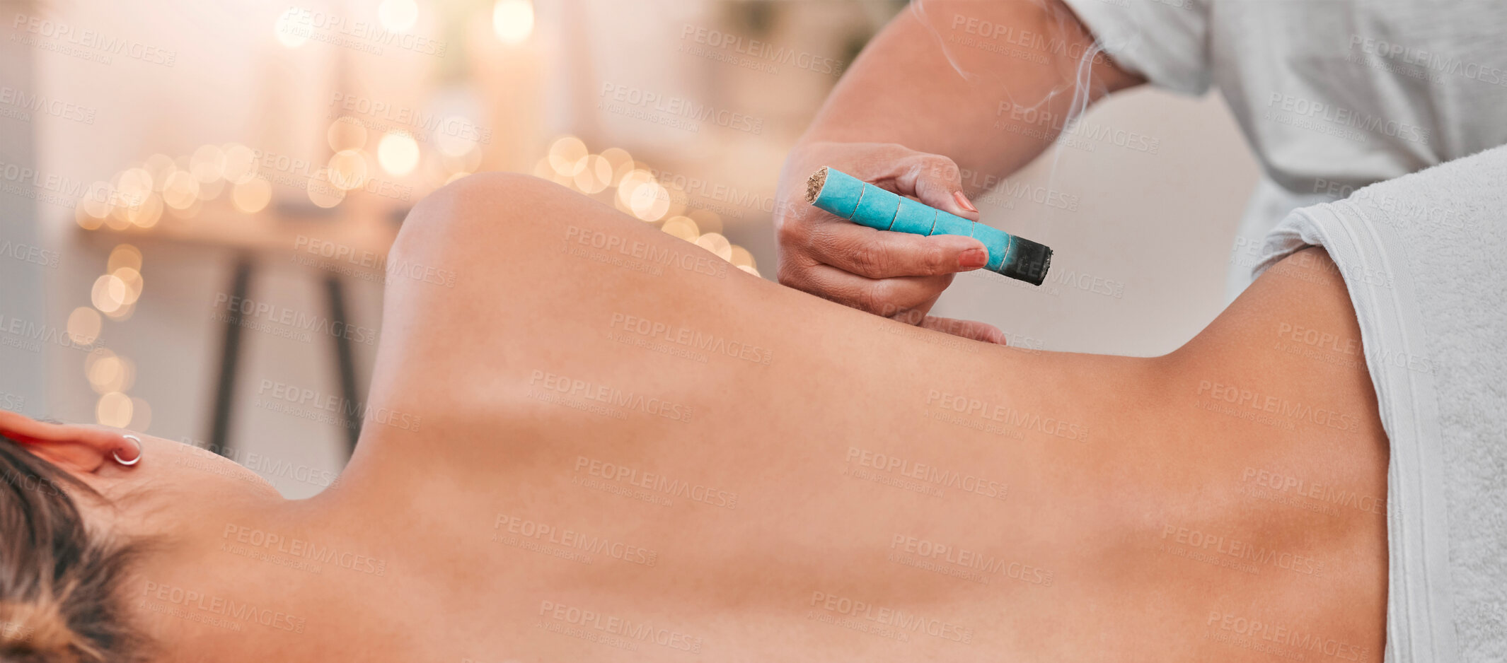 Buy stock photo Spa, heat acupuncture and woman relaxing for a back massage using moxibustion or alternative medicine. Healing, acupuncturist and massage therapy with physical therapy on  patient with sen treatment