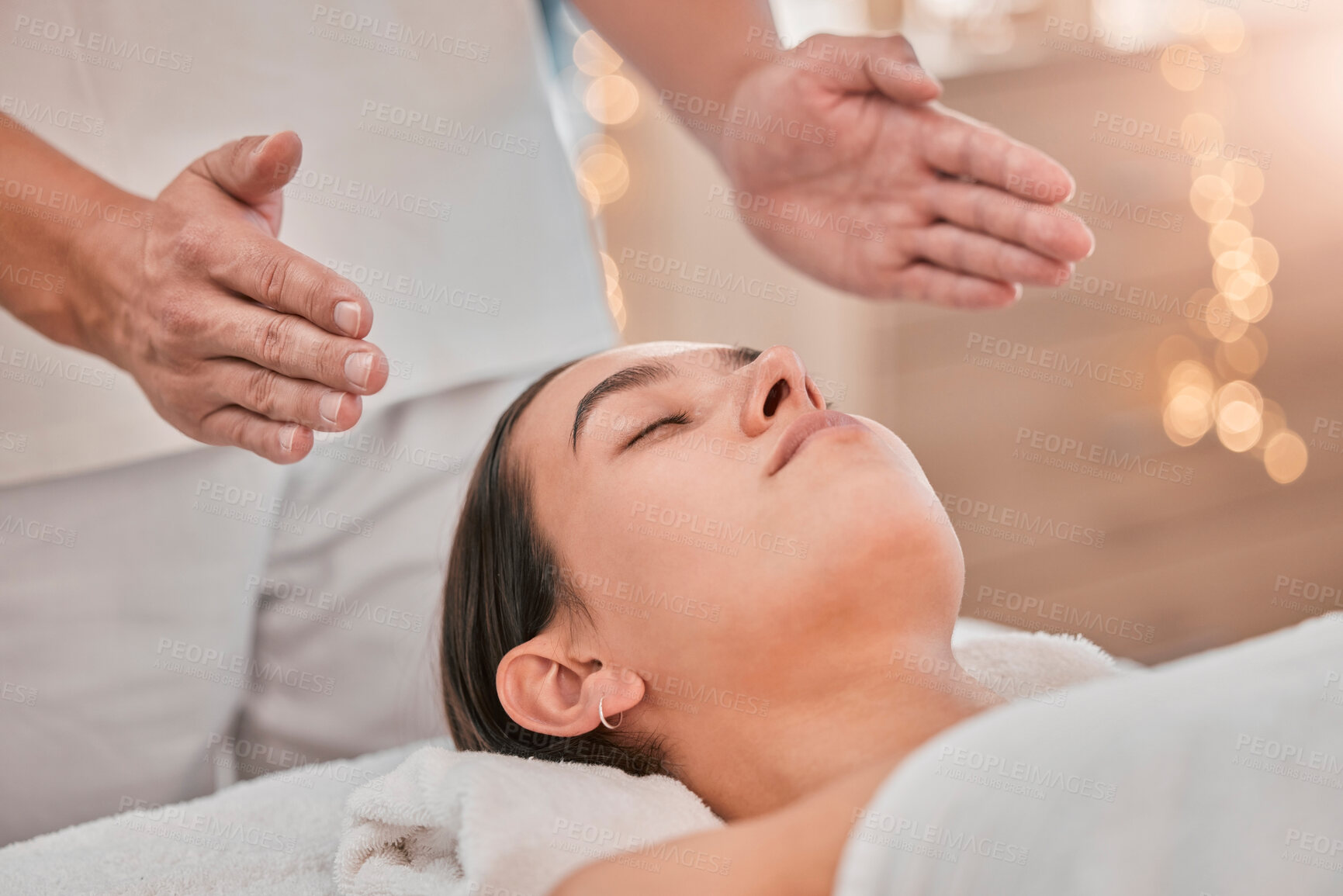 Buy stock photo Spa, massage and reiki with head of woman for energy, chakra and spiritual therapy. Health, wellness and holistic healing with hands of therapist in salon for luxury, relax and alternative medicine 