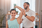 Physical therapy, smile and exercise for shoulder pain of a happy woman with a chiropractor employee. Portrait of arm exercise of a patient feeling relax after a chiropractic and wellness treatment
