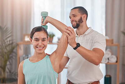 Buy stock photo Physical therapy, smile and exercise for shoulder pain of a happy woman with a chiropractor employee. Arm workout weight lifting of a patient feeling relax after a chiropractic and dumbbell lifting