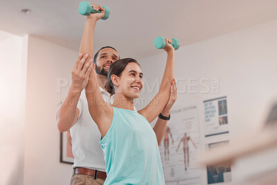 Buy stock photo Physiotherapy, rehabilitation and arm weight exercise of a woman patient and consultant. Physical therapy, health and clinic consultation with weight for wellness consulting and fitness sport