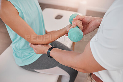 Buy stock photo Physical therapy, dumbbell and physiotherapist help patient in exam room for muscle, body or healthcare rehabilitation. Physiotherapy, helping and support doctor or fitness expert for sport injury