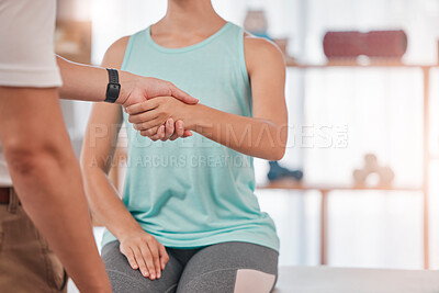 Buy stock photo Physiotherapy, hand shake and woman consulting physiotherapist for spinal, back and problem at a clinic with trust, support and help. Chiropractor, shaking hands and girl client with back pain issue