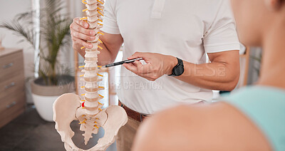 Buy stock photo Spine model, healthcare and chiropractor with woman for consultation or treatment advice. Physiotherapy, wellness and doctor with patient and skeleton explaining cause of back pain, injury or problem