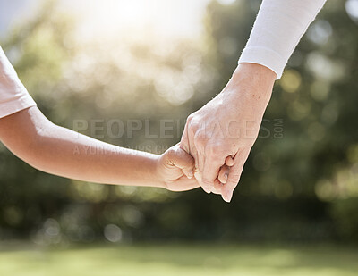 Buy stock photo Park, family and parent holding hands with child enjoying nature, summer holiday and weekend together. Bonding, support and person holding hand of young kid with affection, love and care in nature