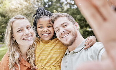 Buy stock photo Adoption, family and with black girl for selfie, smile and happy together outdoor for bonding. Love, foster parents and daughter with mother, father and loving for break, holiday and happiness.