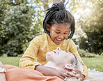 Family, adoption and park with a mother and daughter having fun while bonding during summer. Nature, love and diversity with a foster parent woman and girl child outdoor together with a smile