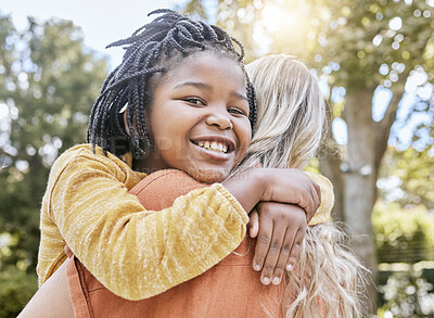 Buy stock photo Mother, interracial adoption and carry girl in park in summer sunshine, happiness and love outdoor. Happy black child, white mom and hug together in nature with smile, embrace and care with diversity