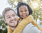 Park, piggyback and father with girl kid in nature playing, bonding and exploring with bokeh. Happy, smile and portrait of an interracial child with her dad in an outdoor green garden or field.