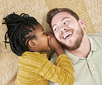 Happy, whisper secret and child in an interracial family with father in a living room with a smile. Dad, girl and kid care of a man with happiness, love and parent care on a home carpet bonding