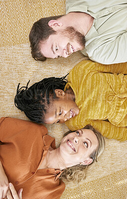 Buy stock photo Relax, floor and adoption family top view of house leisure with smile, happiness and care of parents. Interracial, mother and dad with young black child rest together on comfortable home carpet.


