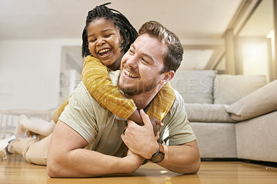 Buy stock photo Family, children and fun with a foster father and girl having fun together on the living room floor of their home together. Love, smile and happy with a man and adopted daughter bonding in a house
