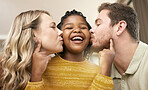 Love, foster and parents kiss daughter for adopted relationship bonding in loving, caring home. Adoption, interracial and mother and father with cheerful little girl being kissed in house