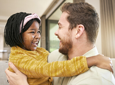 Buy stock photo Black girl, adoption or father in hug in living room or house, family home or orphanage with foster success, support or love trust. Smile, happy child or excited kid bonding with dad, man or parent