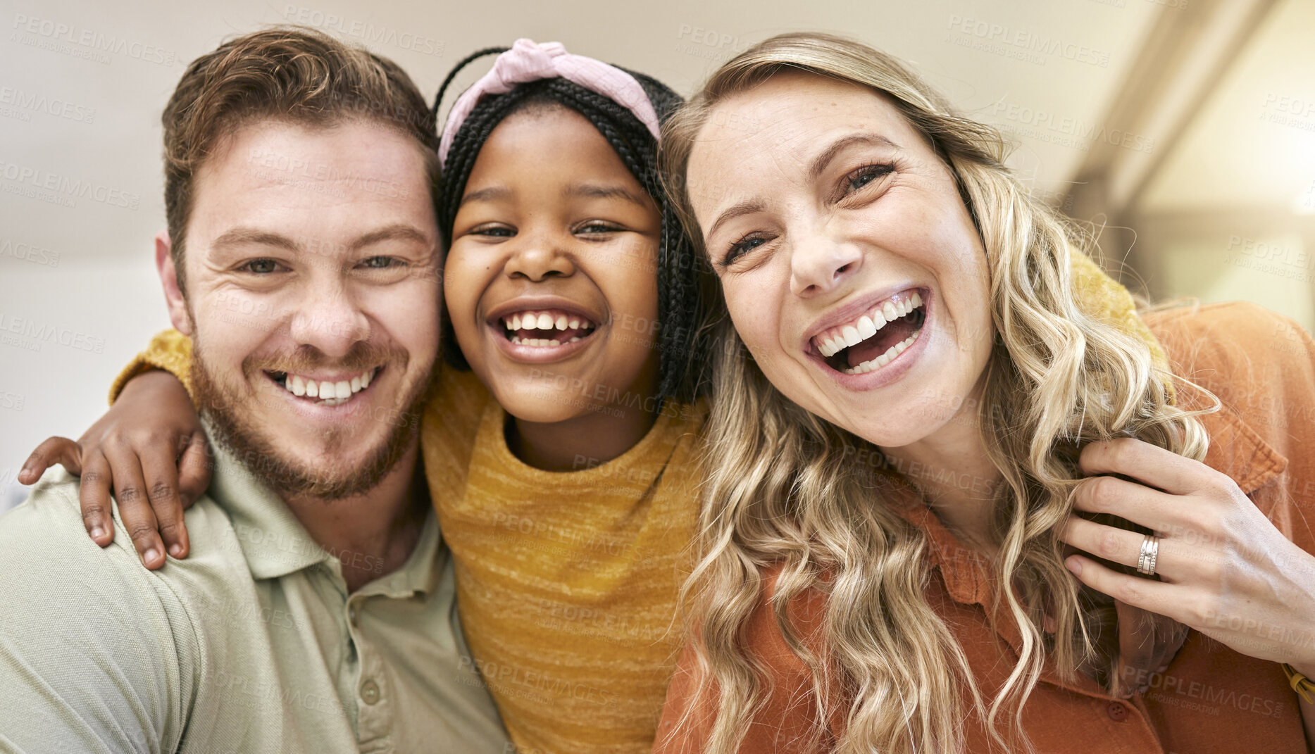 Buy stock photo Family, happiness and love with a portrait for care, support and quality time after adoption with mother, father and foster child together in their home. Face, smile and trust of man, woman and girl