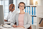 Portrait, call center and customer service with a woman consulting using a headset in her telemarketing office. Sales, retail and support with a female consultant at work on a computer for ecommerce