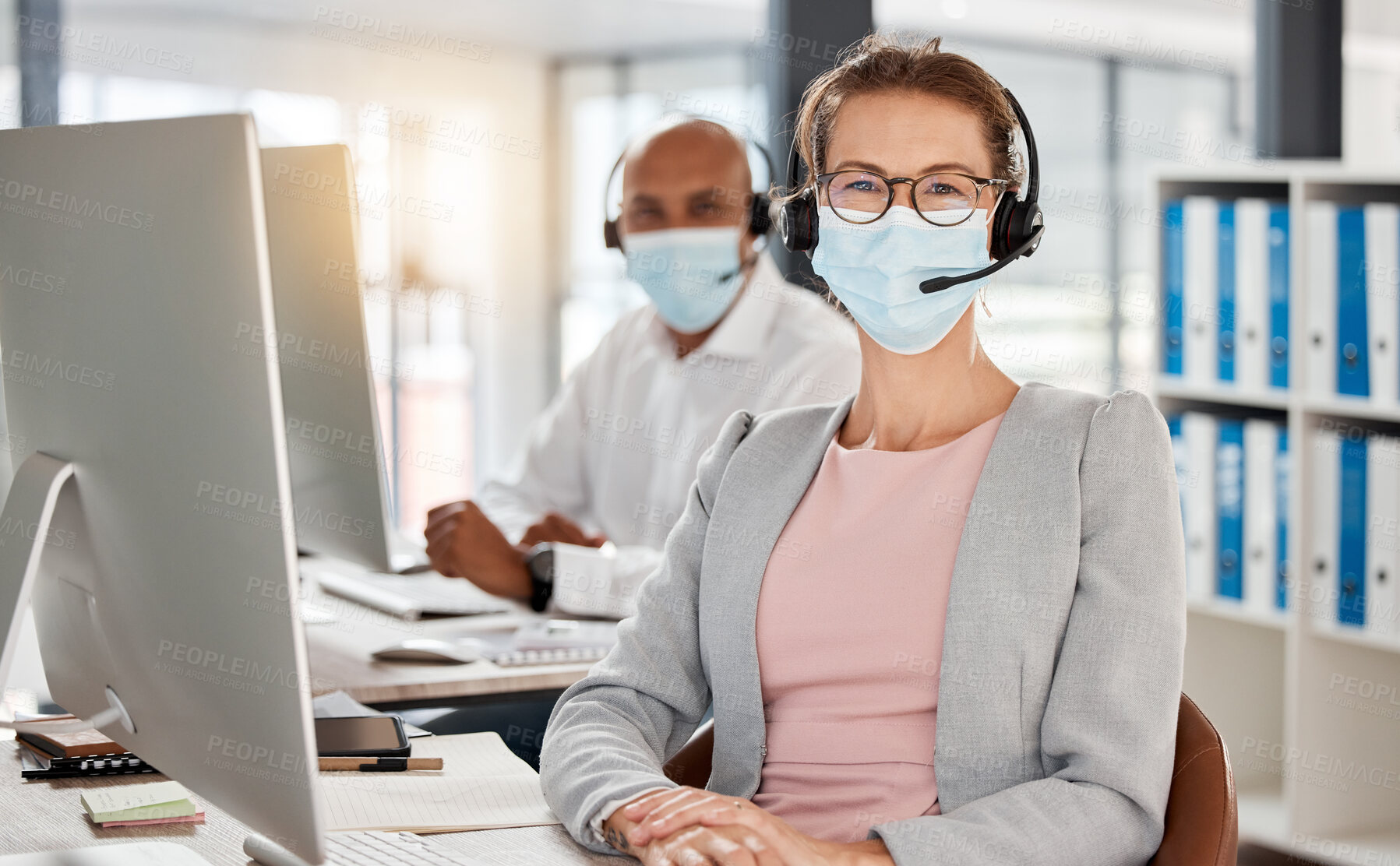 Buy stock photo Covid, call center and portrait in office with medical mask for safety, health and protection from virus at pc. Consultant, telemarketing and workplace people with corona face mask at computer.

