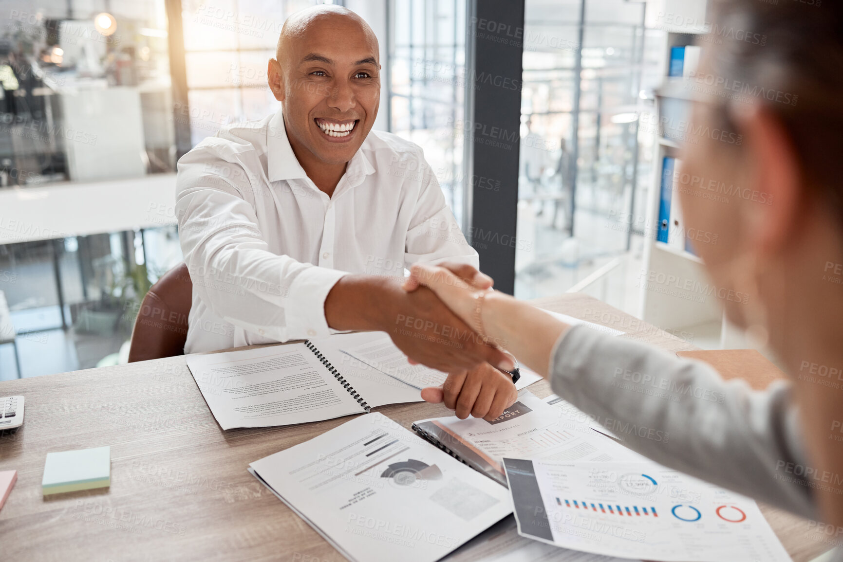 Buy stock photo Handshake, meeting and welcome with a business man and woman shaking hands in an office at work. Teamwork, thank you and partnership with a male and female employee working together in agreement