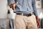 Businessman stretching his hand for a handshake for a deal, welcome or greeting in the office. Professional, corporate and employee with shaking hand gesture for agreement, onboarding or partnership.