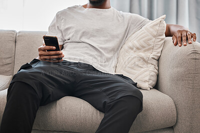 Buy stock photo Social media, relax and man on the sofa with a phone for communication, internet and mobile app chat. Website, connection and person on the couch with a mobile, wifi and search of the web in his home