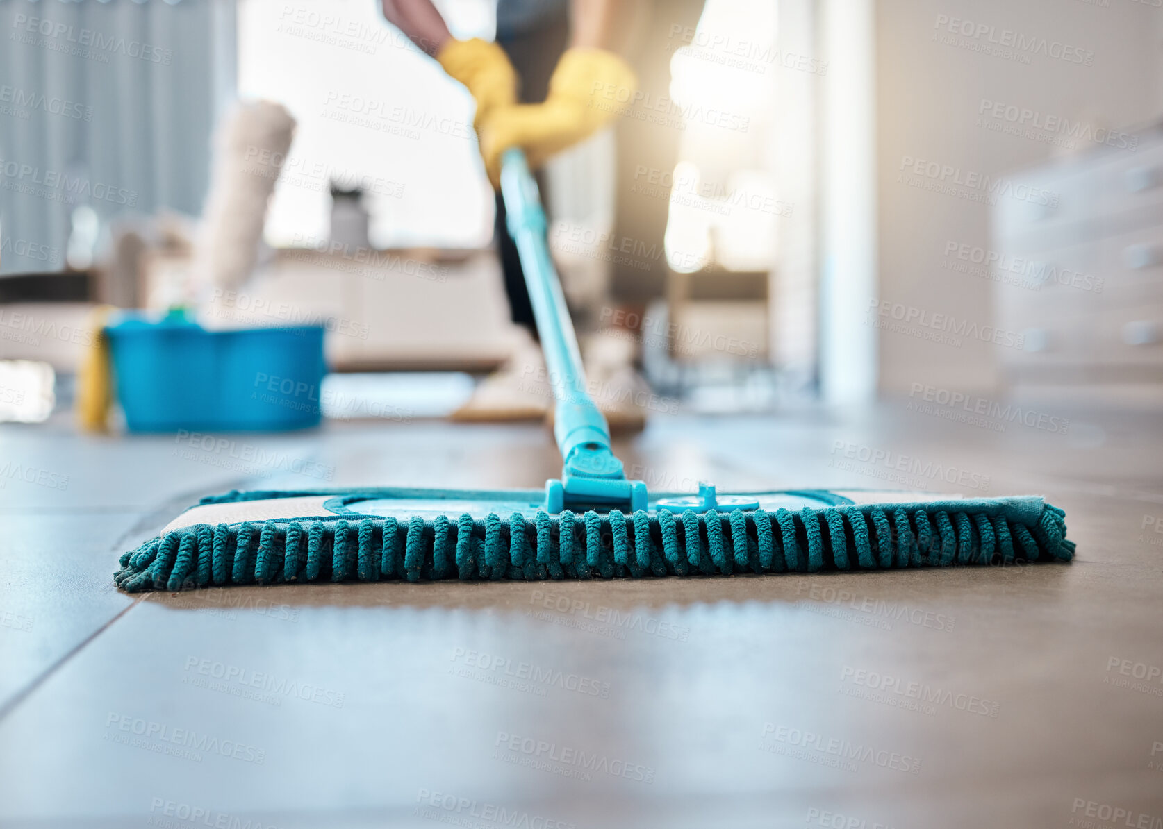 Buy stock photo Man, mopping or cleaning floor in house, home or hospitality hotel for housekeeping product service, maid or worker. Zoom, cleaner or bacteria spring clean, hygiene health or living room maintenance