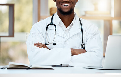 Buy stock photo Healthcare, stethoscope and doctor with crossed arms at desk for support, consultation and wellness. Medicine, medical worker and black man sitting in hospital or clinic with smile, laptop and book