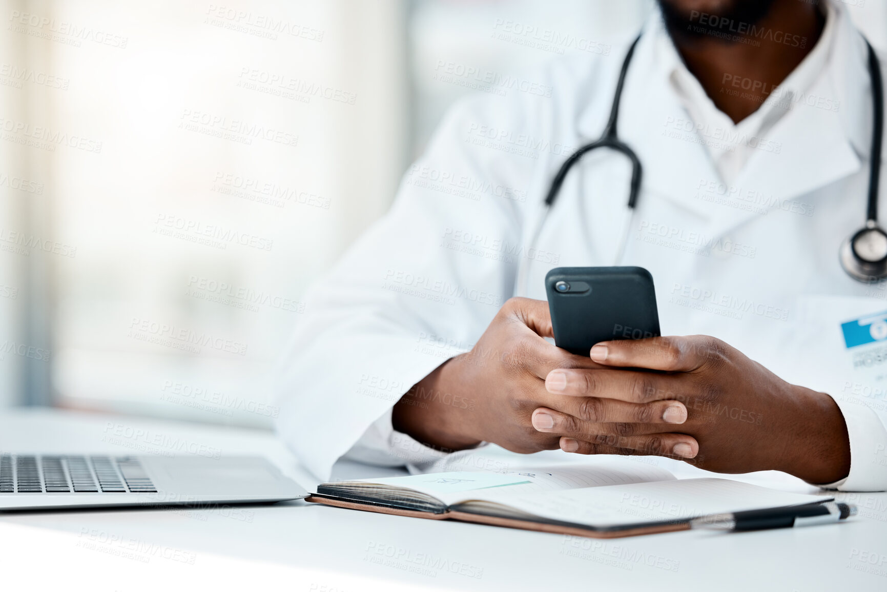 Buy stock photo Black man, doctor hands or phone or laptop, notebook or mobile for medicine research, surgery schedule or life insurance planning. Zoom, healthcare worker or employee with technology for hospital web