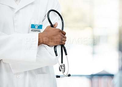 Doctor hands, healthcare and medical with stethoscope in hand of expert for research, heartbeat or breathe in hospital office. Therapist, arms crossed or consulting with health professional in clinic