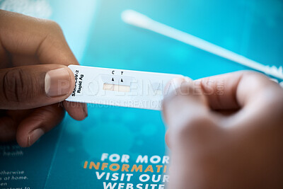 Buy stock photo Covid, antigen test and hand of a patient looking at test results for coronavirus illness and reading pamphlet. Analyse,  medical exam and covid19 antibody test on a pcr device for a sick person