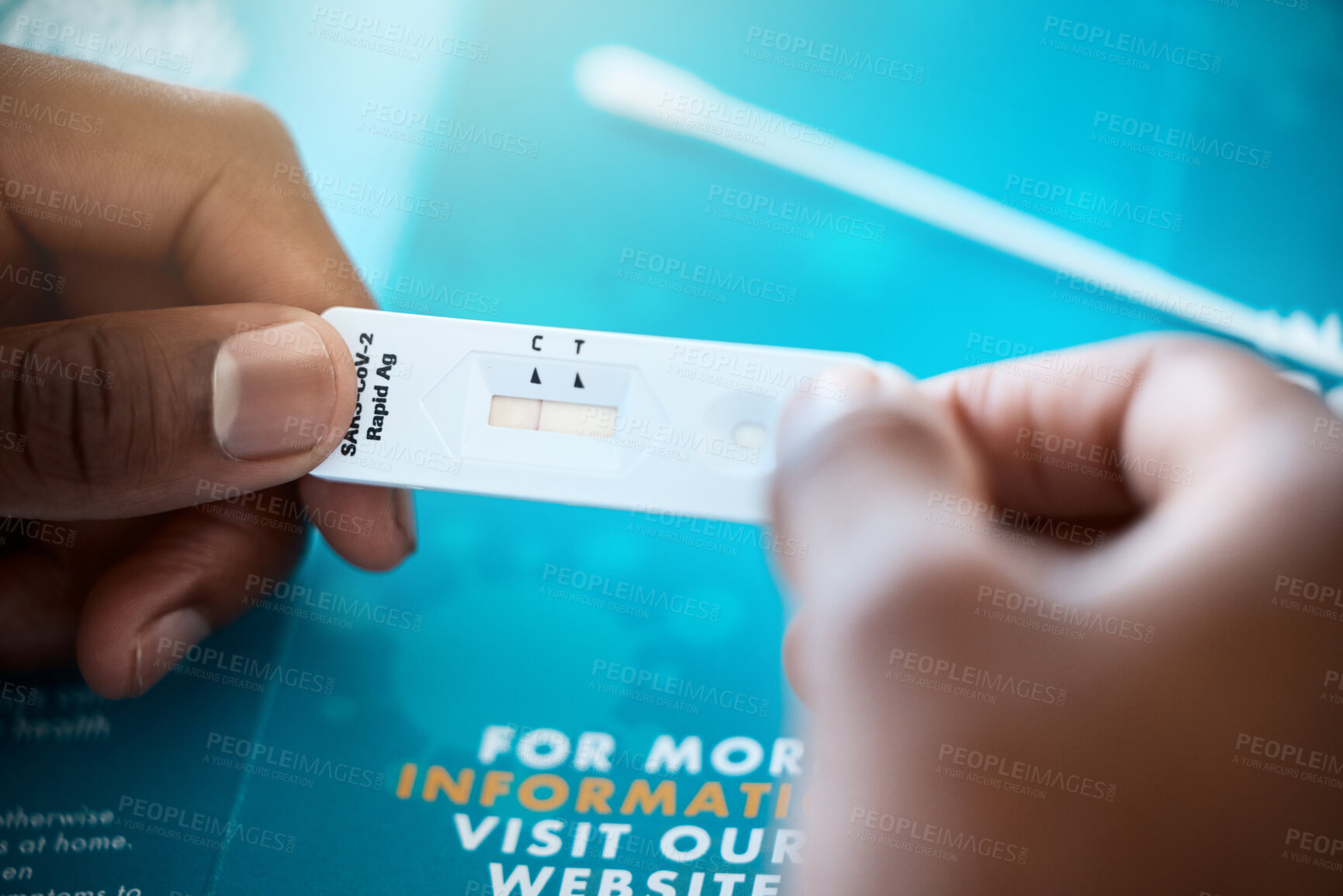 Buy stock photo Covid, antigen test and hand of a patient looking at test results for coronavirus illness and reading pamphlet. Analyse,  medical exam and covid19 antibody test on a pcr device for a sick person