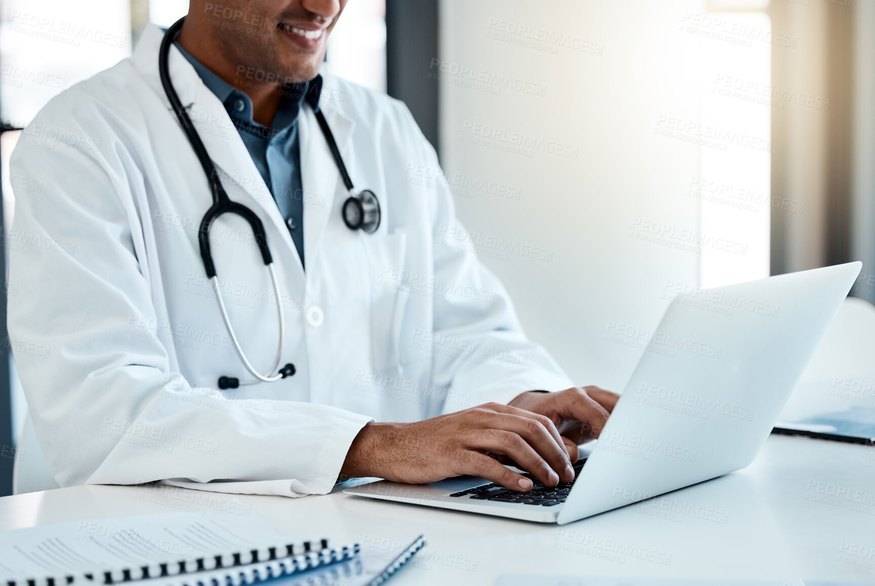 Buy stock photo Doctor, laptop and typing email or online medical prescription for healthcare treatment plan. Hospital, clinic and male physician or specialist browsing digital medicine data or information