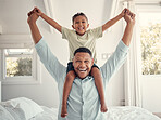 Father, child and smile for bedroom piggyback relaxing or fun playful bonding together at home. Happy dad and kid holding hands on shoulders for family time, relax and playing joy on the bed indoors