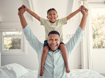 Buy stock photo Father, child and smile for bedroom piggyback relaxing or fun playful bonding together at home. Happy dad and kid holding hands on shoulders for family time, relax and playing joy on the bed indoors