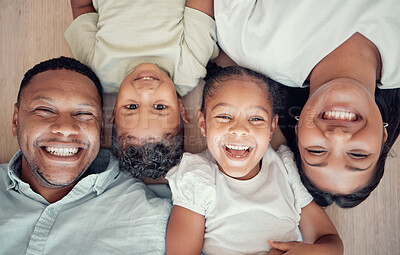 Buy stock photo Top view, parents or children bonding on floor in house bedroom or home living room in fun, playful or happy family portrait. Smile, mother or father and kids, girl or boy in trust, security and love