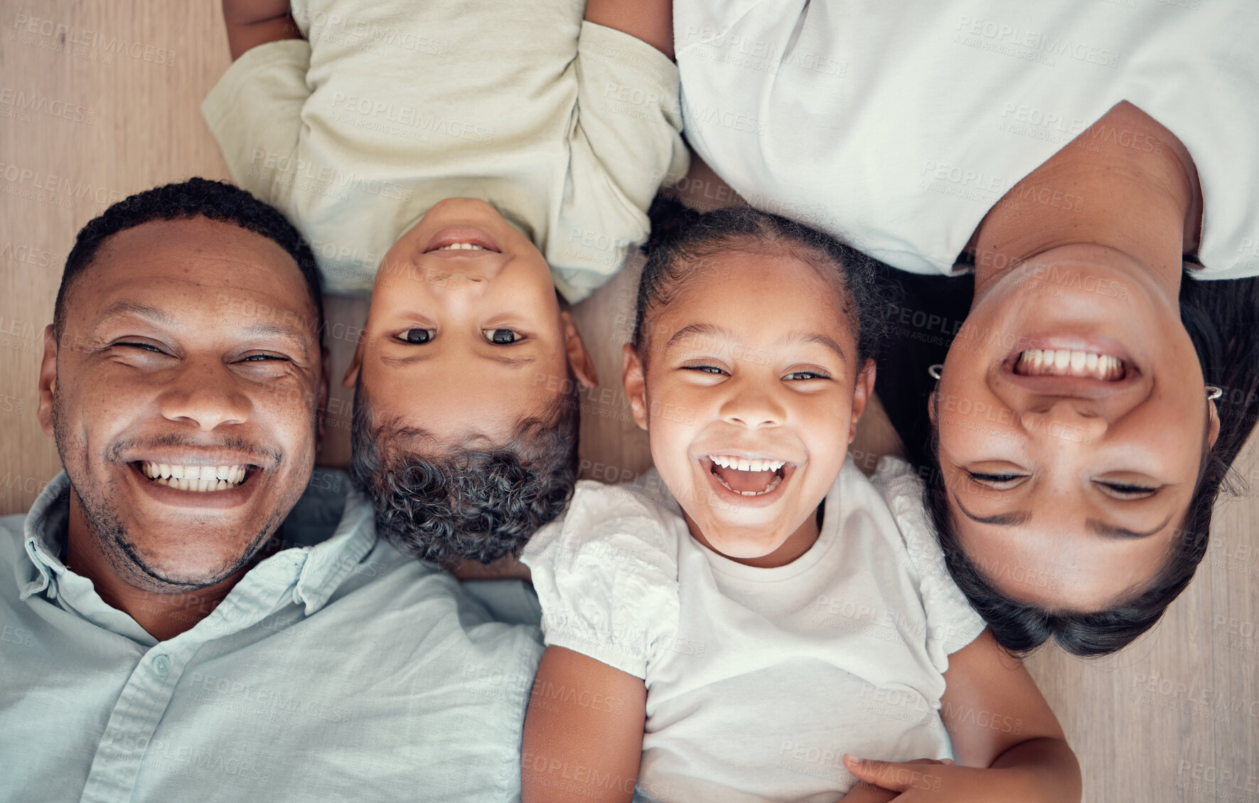 Buy stock photo Top view, parents or children bonding on floor in house bedroom or home living room in fun, playful or happy family portrait. Smile, mother or father and kids, girl or boy in trust, security and love