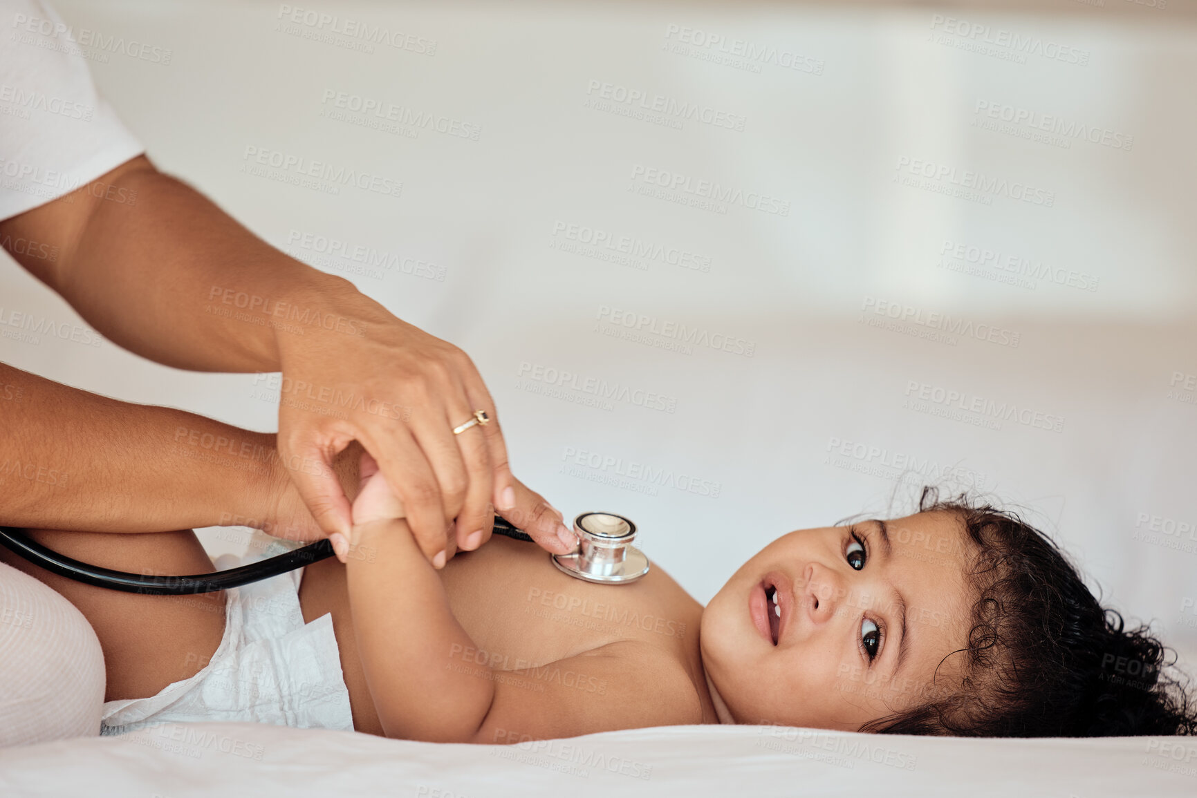 Buy stock photo Medical, consulting and stethoscope with baby on bed for healthcare, cardiology and pediatrician exam. Help, medicine and check with hands of doctor and heartbeat of child for growth, lungs or breath