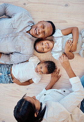 Buy stock photo Family, love and relax on floor together at home for quality time, care or support relationship bonding. Happy family, mom play and comic children smile, laughing and fun for freedom and happiness