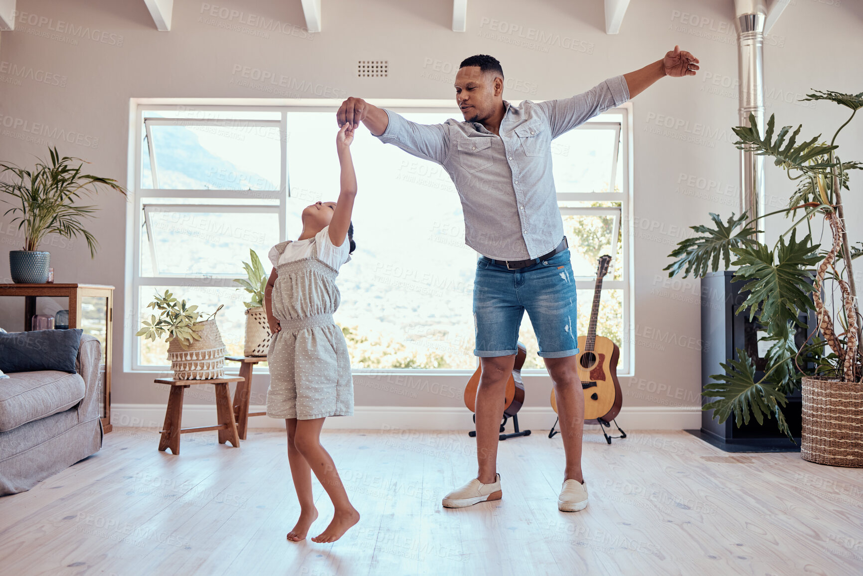 Buy stock photo Father, daughter and dancing in living room family home with energy, freedom and fun, relax and happy lifestyle together. Dad, girl kid and happy family spinning dance to music, bonding and happiness