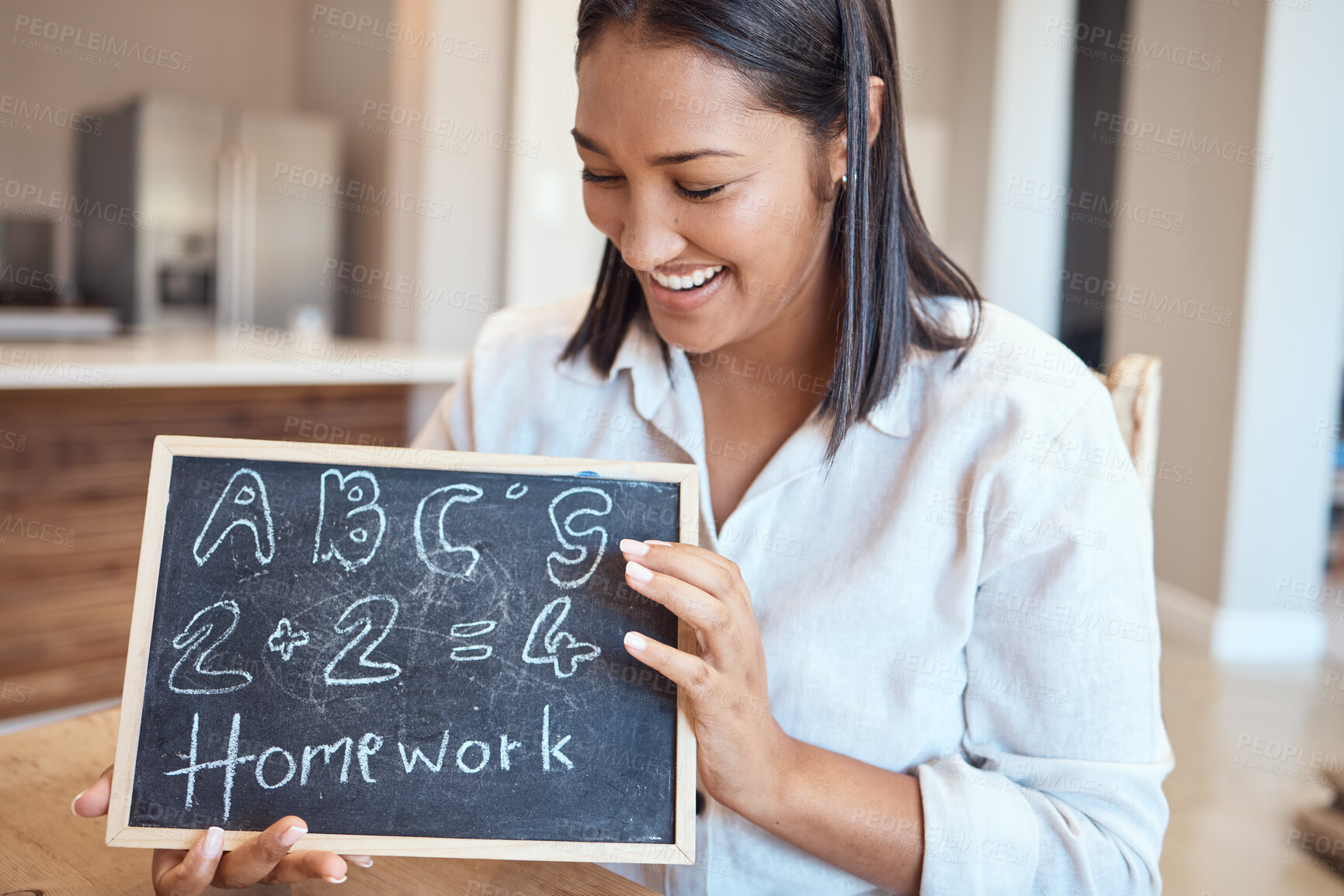 Buy stock photo Learning, education and woman with homework blackboard for studying alphabet and numbers. Abc, mathematics and female teacher or educator from India holding chalkboard with equations and grammar.