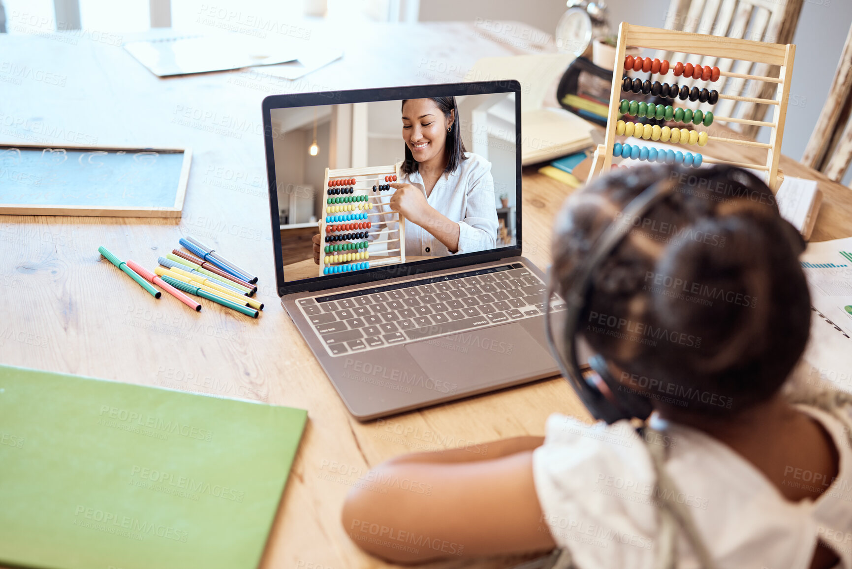 Buy stock photo Kid student, study online with laptop and learning mathematics, counting and numbers with digital teacher. Elearning course, abacus and child listening to lecture on headphones on a living room table