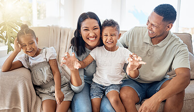 Buy stock photo Love, black family and being happy, silly and have fun together on couch in living room. Parents, mother and father with children, happiness and bonding on sofa in lounge for quality time or playful 