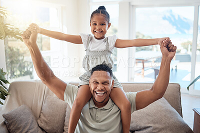 Buy stock photo Happy, shoulders and father with girl on sofa for bonding, playing or support together. Airplane, smile and relax with portrait of dad and child in living room of family home for energy, care or time