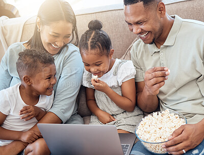 Buy stock photo Movie, popcorn and family on sofa with laptop watching, streaming and laughing at comedy. Love, black family and mom and dad with children eating snack, bonding and enjoying online entertainment