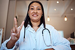Doctor, black woman and peace sign in portrait hospital with smile, happiness and proud at medical job. Woman, nurse or happy medic in clinic, office or workplace for healthcare with hand signal